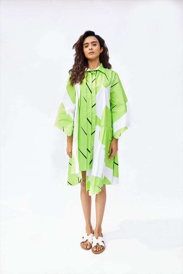 Leafy Belle Dress – Nature-Inspired White Midi with Flared Sleeves & Bold Leaf Print
