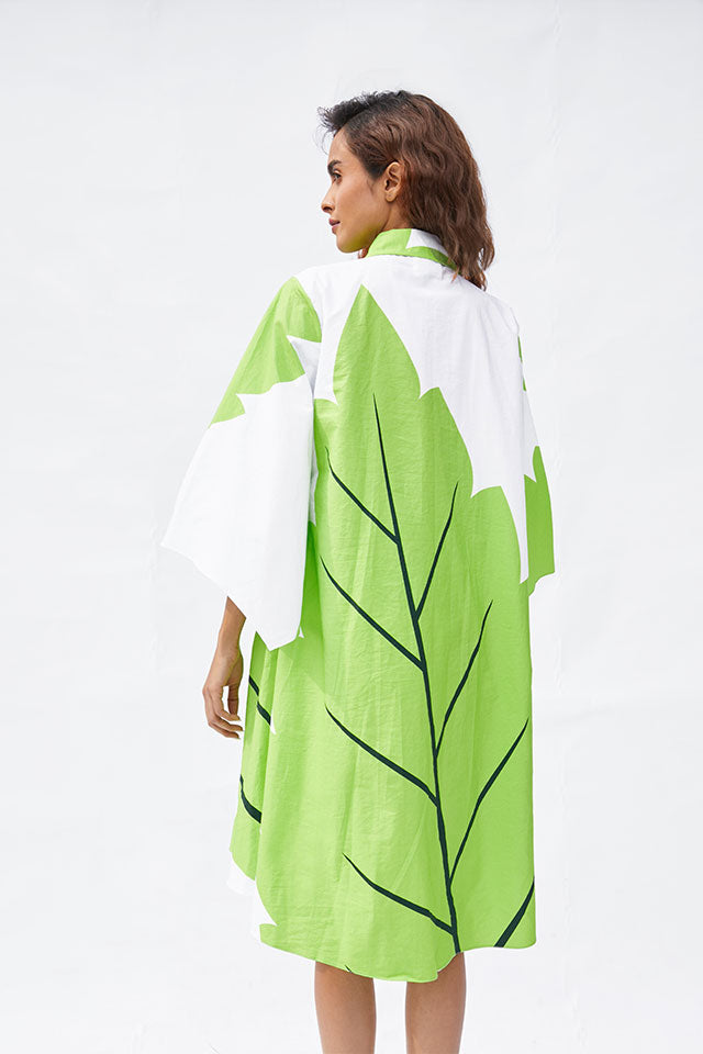 Leafy Belle Dress – Nature-Inspired White Midi with Flared Sleeves & Bold Leaf Print