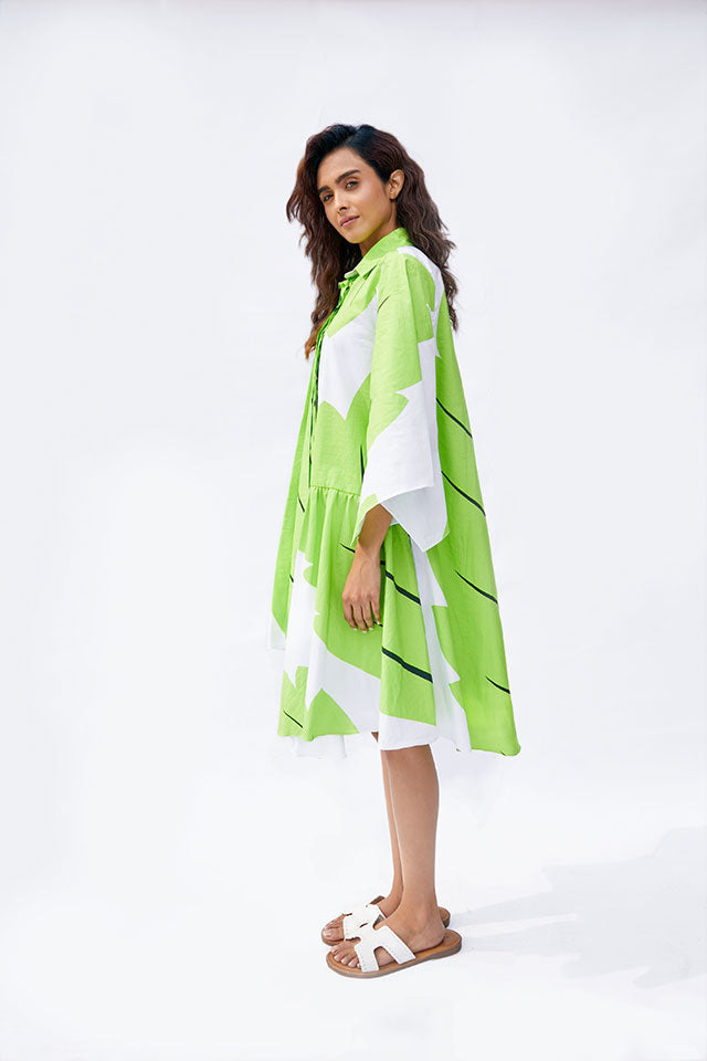 Leafy Belle Dress – Nature-Inspired White Midi with Flared Sleeves & Bold Leaf Print