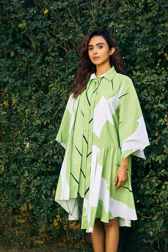 Leafy Belle Dress – Nature-Inspired White Midi with Flared Sleeves & Bold Leaf Print
