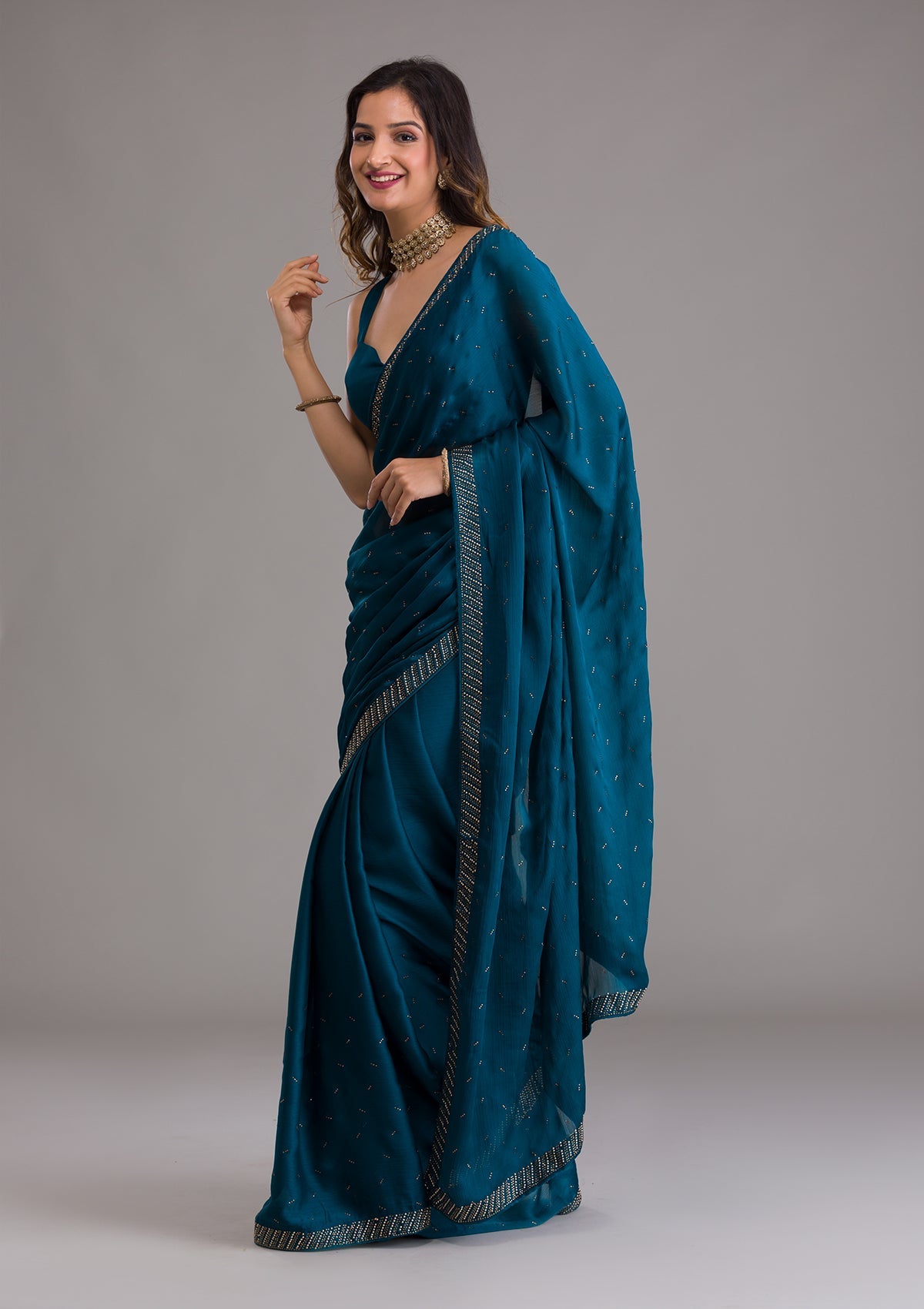 Teal Semi Crepe Saree with Silver Stonework – Elegant Celebration Wear