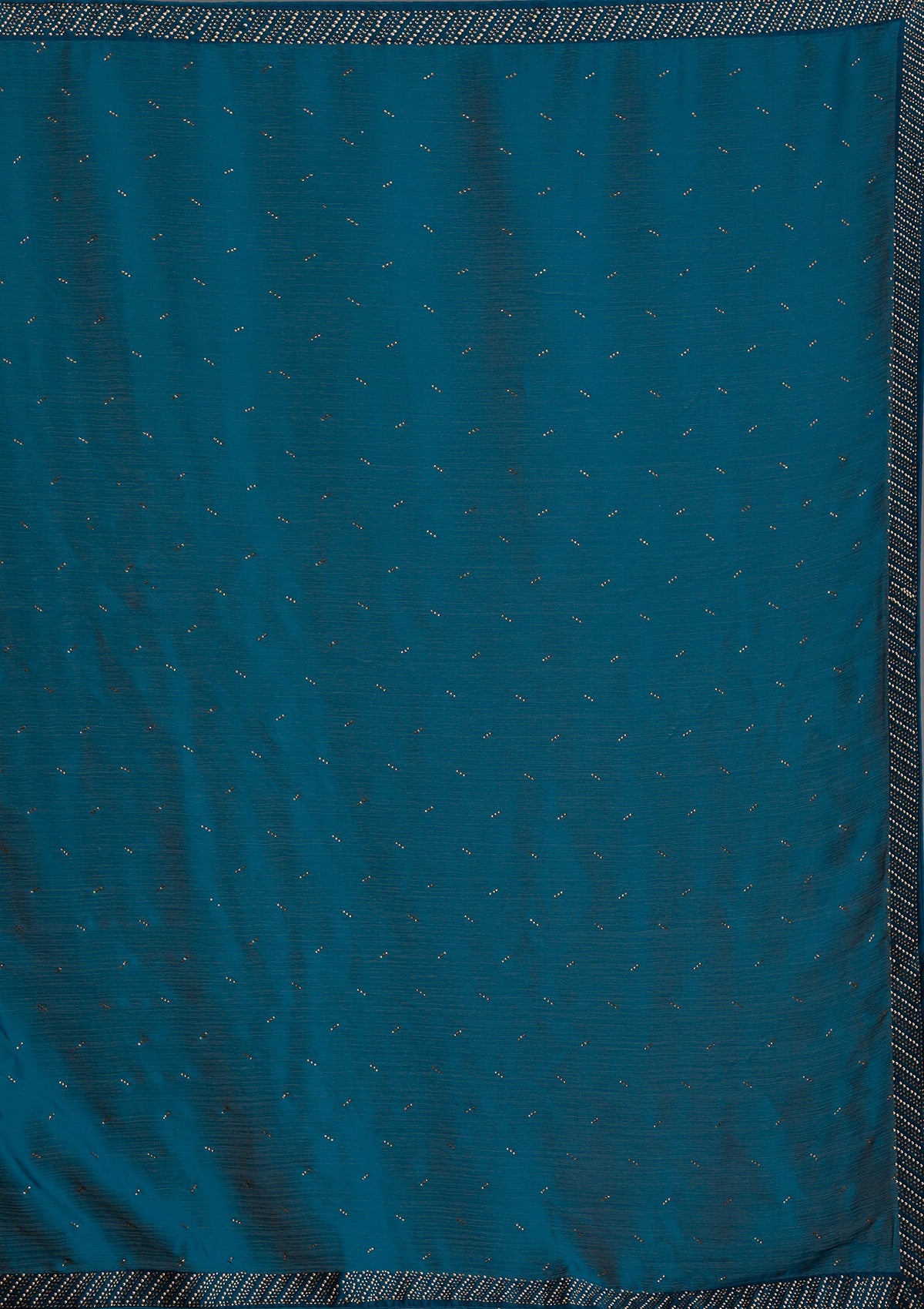 Teal Semi Crepe Saree with Silver Stonework – Elegant Celebration Wear